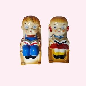 Large Vintage Salt And Pepper Children in Rocking chairs with lenticular eyes